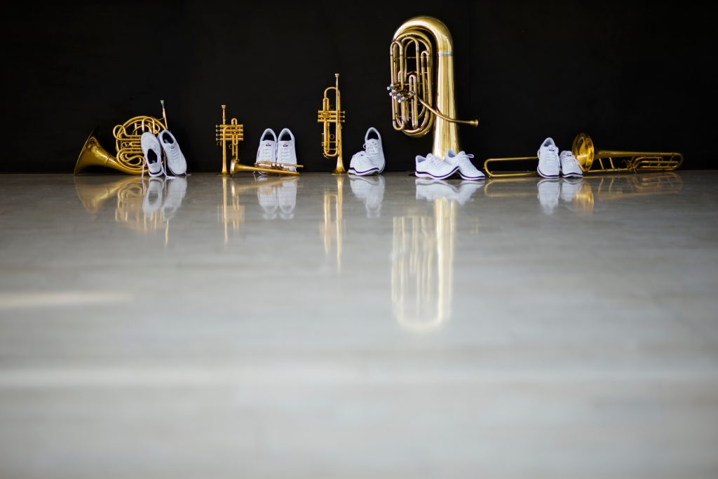 Canadian Brass Image of white shoes and Brass Instruments, Quintet.