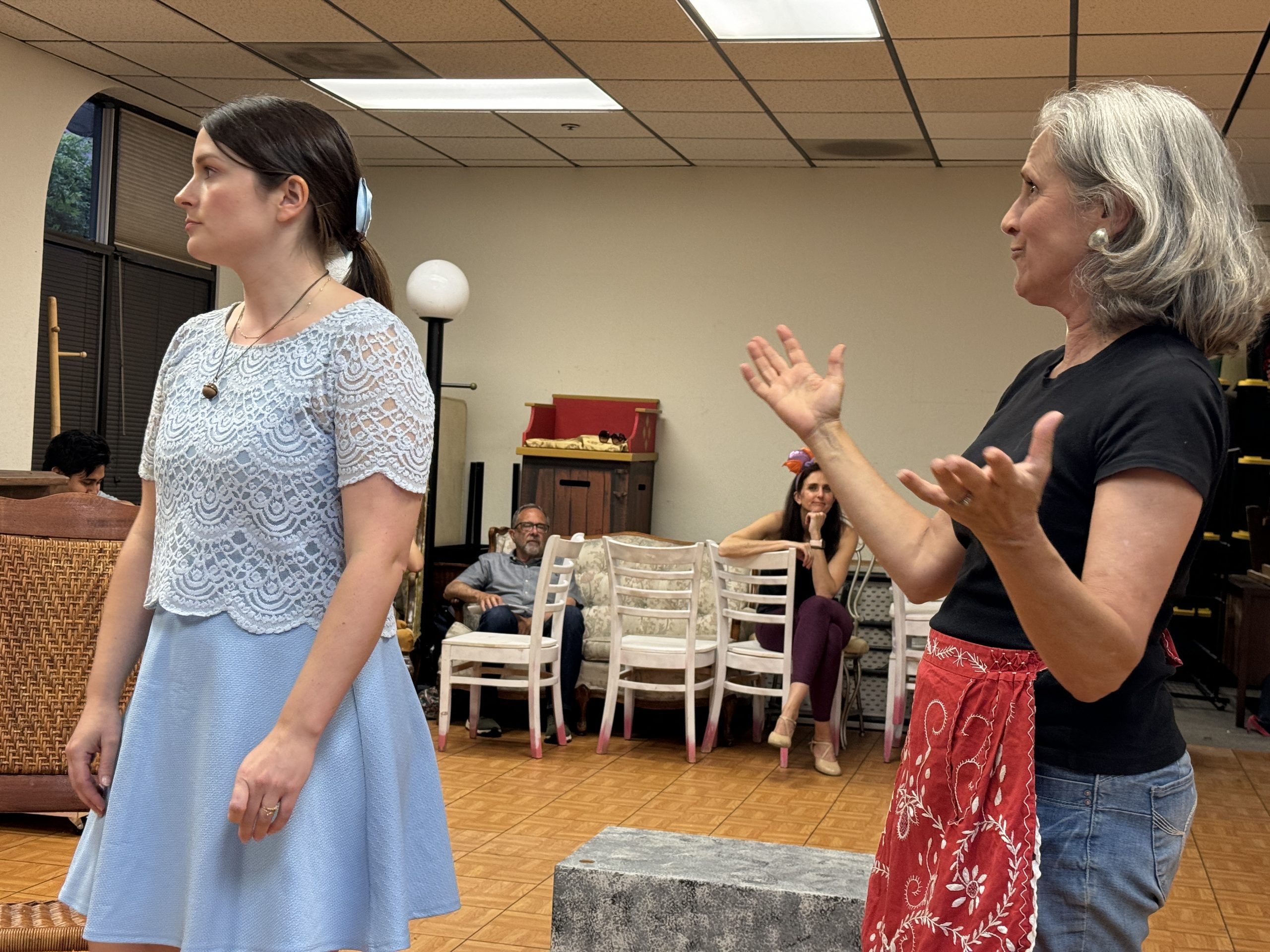 Marian Paroo (Rebecca Davis) and Mrs. Paroo (Jill Vellinger) rehearsing for TVTC The Music Man.